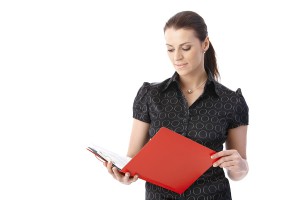 bigstock-Businesswoman-standing-reading-35457353 (2)